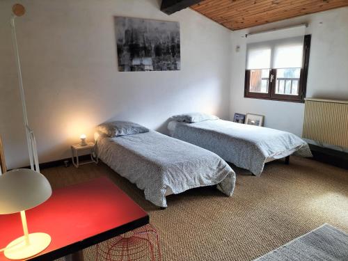 En eller flere senge i et værelse på la maison sous le château