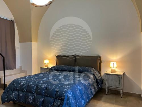 En eller flere senge i et værelse på Le Volte - Santa Maria al Bagno By Cala Salento