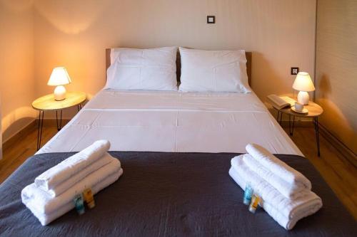 Katil atau katil-katil dalam bilik di Evita home karavados