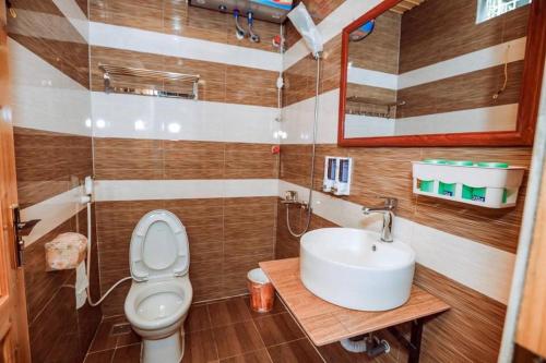 Koupelna v ubytování Homestay Cối Xay Gió Hà Giang