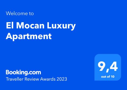 niebieski znak z tekstem el modern luxury jmenendar review w obiekcie El Mocan Luxury Apartment w mieście Palm-Mar