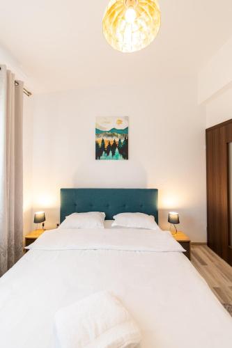 Katil atau katil-katil dalam bilik di Citadel Apartament's