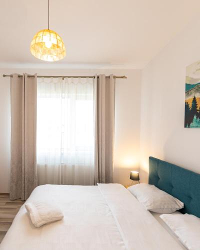 Katil atau katil-katil dalam bilik di Citadel Apartament's