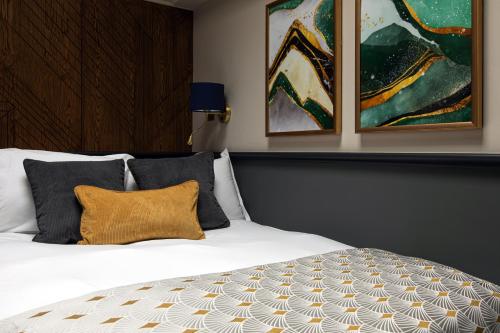 Katil atau katil-katil dalam bilik di Hort's Townhouse