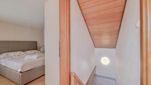 Ένα ή περισσότερα κρεβάτια σε δωμάτιο στο Casa Ivana