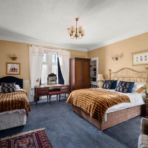 Llit o llits en una habitació de Ashley House