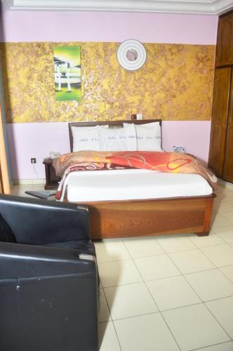 Ein Bett oder Betten in einem Zimmer der Unterkunft HOTEL DE LA VALLEE NEW
