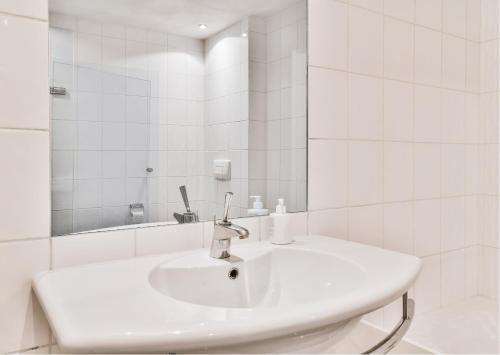 Koupelna v ubytování Zingle Stay Airport Hotel