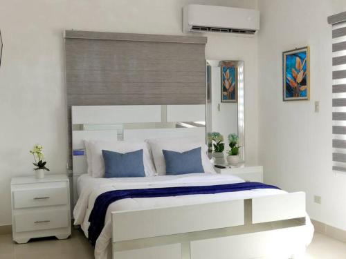 Postel nebo postele na pokoji v ubytování Cipres Deluxe