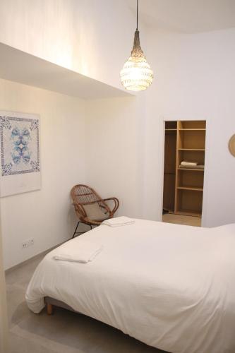 Posteľ alebo postele v izbe v ubytovaní Appartement T3 à 5 minutes du port et de la plage 37