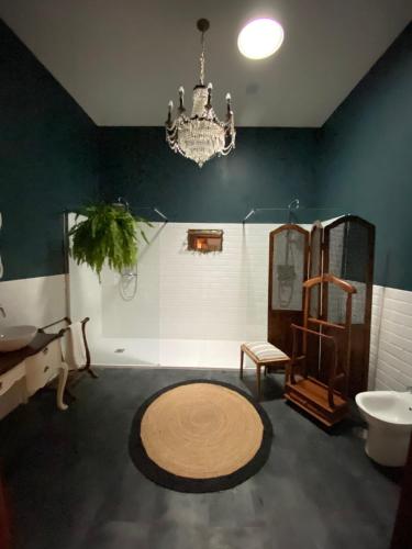 Ett badrum på Casa das Amendoeiras