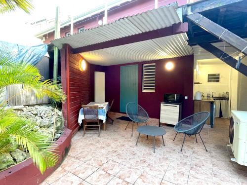 Pati o zona exterior de plage et spot de surf
