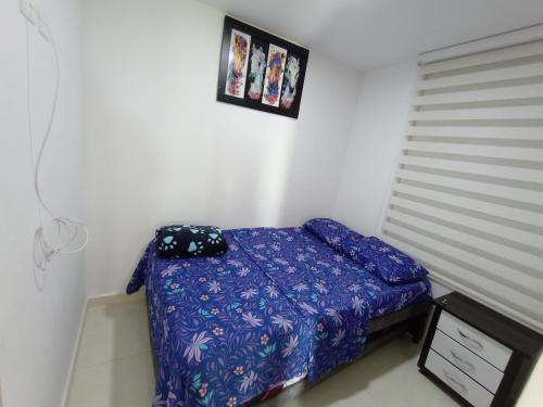 Katil atau katil-katil dalam bilik di Apartamento Paraíso Cafetero