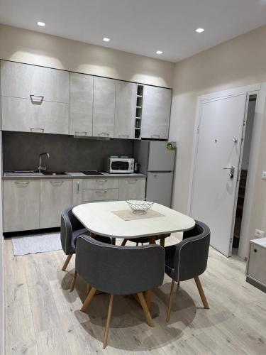 Kuchyň nebo kuchyňský kout v ubytování Brilant Apartament