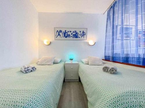 Posteľ alebo postele v izbe v ubytovaní Ocean Front Apartment