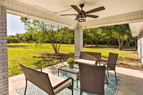 a patio with chairs and a table and a ceiling fan at about 3 Mi to Dtwn McKinney Suburban Texas Retreat in McKinney