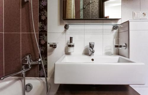Kúpeľňa v ubytovaní Doba In Ua Peremoga Apartments