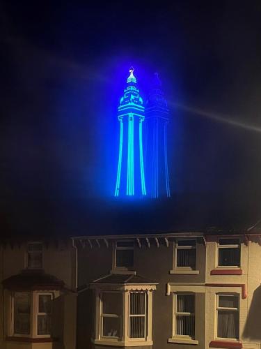 a building with a blue light on top of it at Stay at 25 in Blackpool
