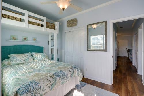a bedroom with a bed and a ceiling fan at Fort Myers Home Near Sanibel Island Causeway in Fort Myers