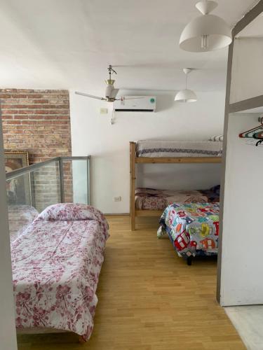 Katil atau katil-katil dalam bilik di Hermoso dúplex interno en la mejor zona de Mendoza