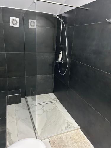 Koupelna v ubytování Pensiunea Giulia Home