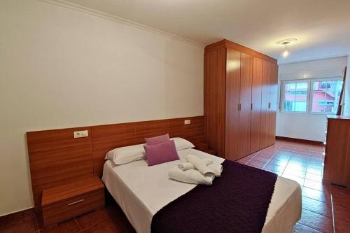 Postel nebo postele na pokoji v ubytování Apartamento Vacacional Camiño a Quenxe