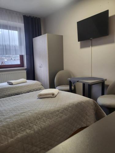 Postel nebo postele na pokoji v ubytování Gościniec Pieniński