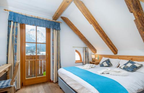 A bed or beds in a room at Casa il Tiglio