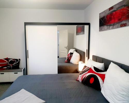 a bedroom with a bed with a motorcycle on it at Moderne Ferienwohnung mit Balkon direkt an der Peene in Ziemitz