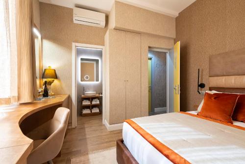 Postel nebo postele na pokoji v ubytování Royal Rooms Corso