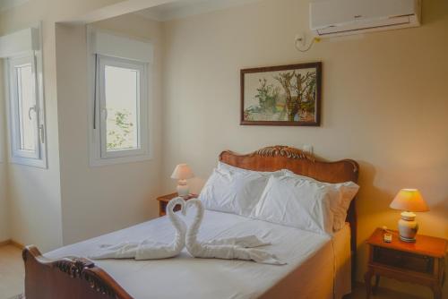 Postel nebo postele na pokoji v ubytování Apartamento Vivendas de Canela, uma quadra da Catedral