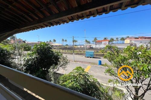 a view from a balcony of a parking lot at @euamotemporada Cumaru APT 207 - 100m da Praia in Marechal Deodoro