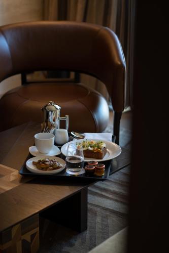 a tray with two plates of food on a table at Nobu Hotel Atlanta in Atlanta