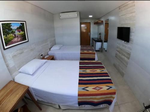 Katil atau katil-katil dalam bilik di EMA HOTEL