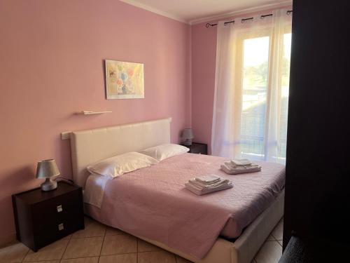 Ein Bett oder Betten in einem Zimmer der Unterkunft Casa Cristina