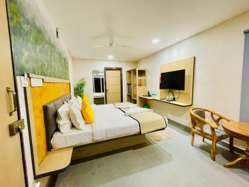 Hotel Lake View Airport zoneにあるテレビまたはエンターテインメントセンター