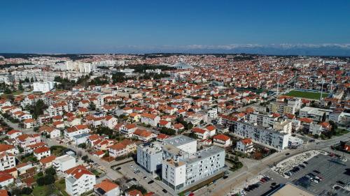 an aerial view of a city with buildings at Zadar Sunset Penthouse with spectacular view and jacuzzi in Zadar