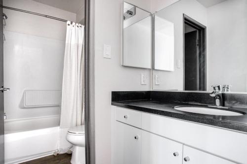 a bathroom with a sink and a toilet at Pasadena 2BR w Gym Pool nr Colorado Ave LAX-864 in Pasadena
