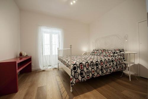 เตียงในห้องที่ Casa l'Amuri