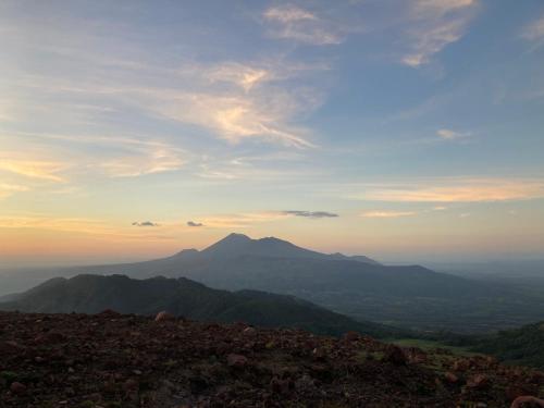 a view of a mountain in the distance at Hotel Tranquilo in Las Peñitas
