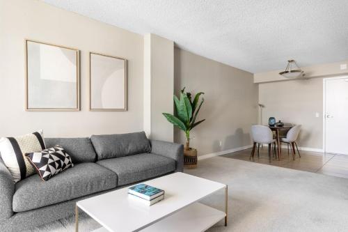 a living room with a couch and a table at Cupertino 2BR w Gym Pool nr Apple Google SFO-310 in Cupertino