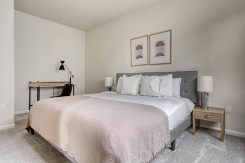a white bedroom with a large bed and a desk at San Jose 1BR w Pool Gym nr Caltrain SFO-766 in San Jose
