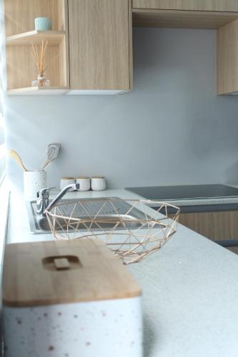 a kitchen counter with a basket on top of it at Home Away From Home in Johannesburg