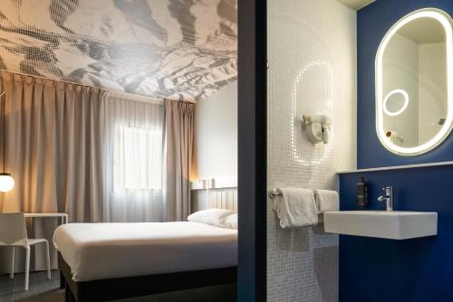 Cama o camas de una habitación en ibis Paris Nation Davout