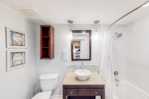 a bathroom with a sink and a toilet and a shower at Elation #5316 in Destin
