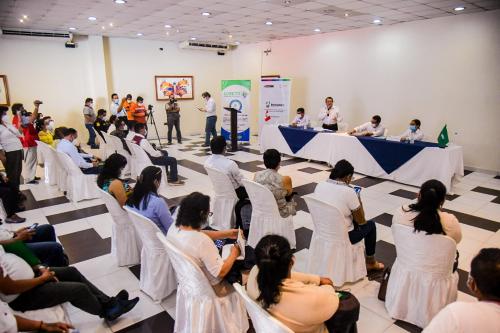 a group of people in a room with a group of people at Samiria Jungle Hotel in Iquitos