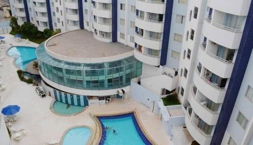 an aerial view of a building with a swimming pool at APARTAMENTO AGUAS DA SERRA 713 A in Rio Quente