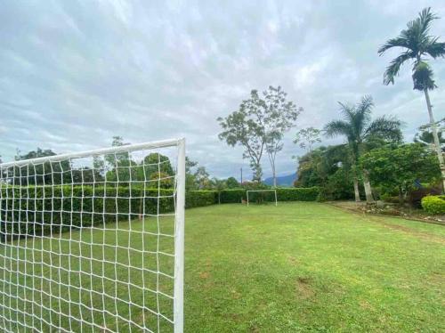 a soccer field with a goal in the grass at FINCA EL PORVENIR in Acacías
