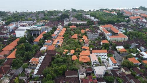 an aerial view of a city with houses at Three Brothers Bungalows & Villas in Legian