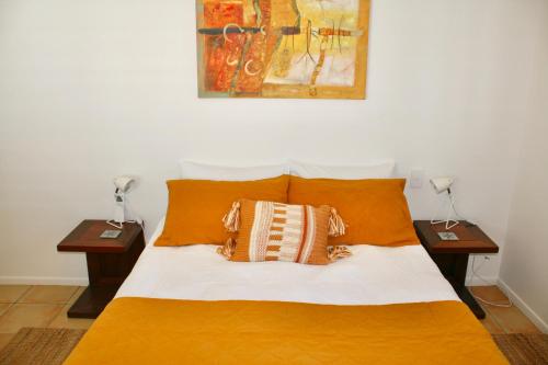 Downtown Byron Bay Guesthouseにあるベッド
